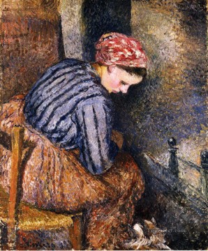 Camille Pissarro Painting - Mujer campesina calentándose 1883 Camille Pissarro